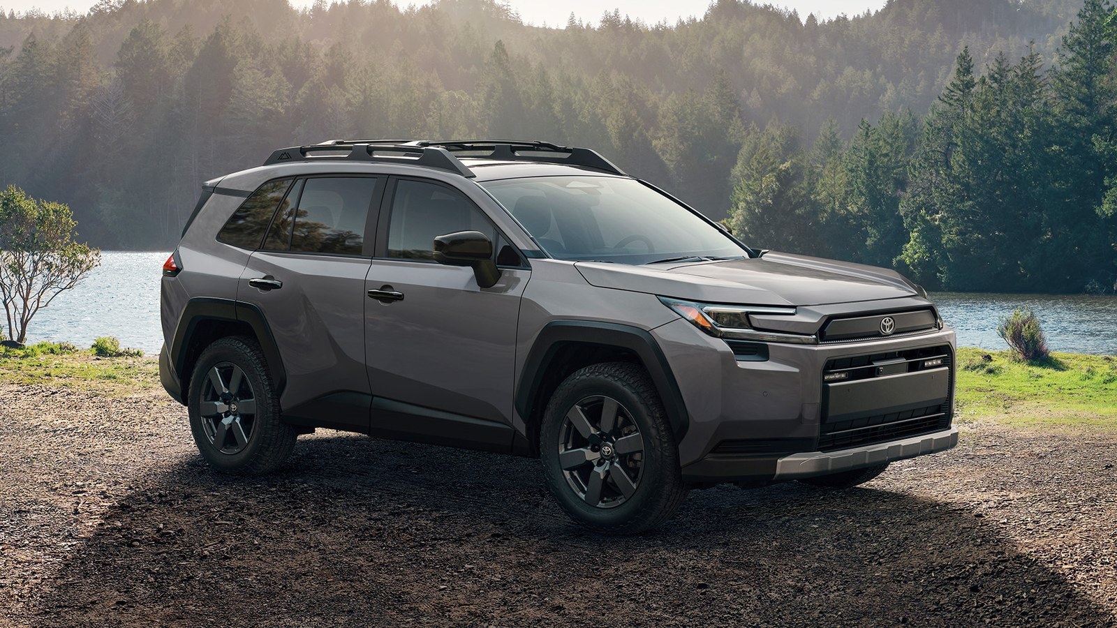 2026 Toyota RAV4 Woodland parked on gravel by a lake