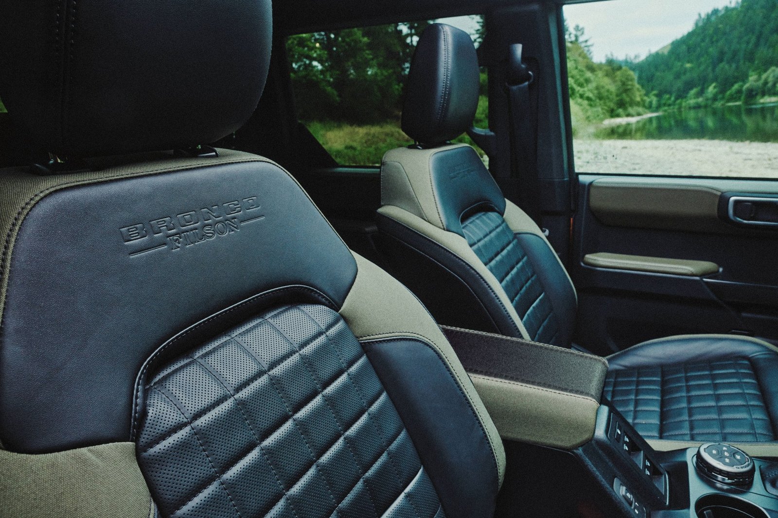 Front seats of the 2027 Ford Bronco Filson with Bronco Filson lettering embossed on the seatback