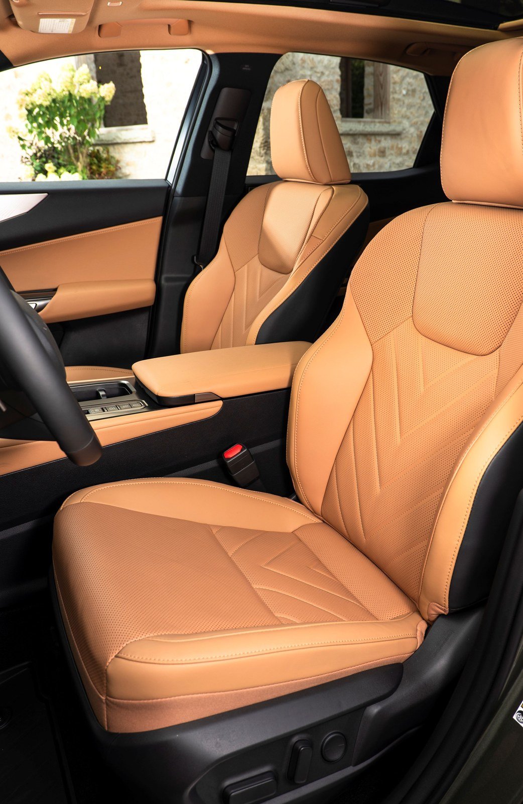 Tan leather front seats of the 2027 Lexus NX 450h+ Luxury